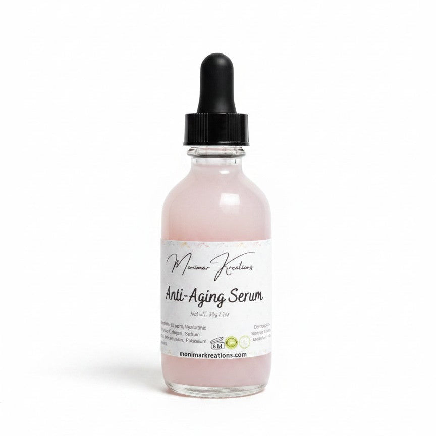 monimarkreations Anti-Aging Serum in a clear glass bottle with a dropper lid. Pink serum inside.