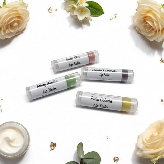monimarkreations lip balm collection featuring Minty Vanilla, Sweet Kiss, Lavender & Lemonade, and Pi00a Colada flavors.