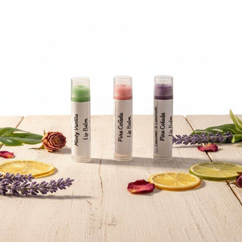 monimarkreations Lip Balm in Minty Vanilla, Sweet Kiss, Lavender & Lemonade, and Pina Colada flavors. Nourishing balm for soft, hydrated lips.