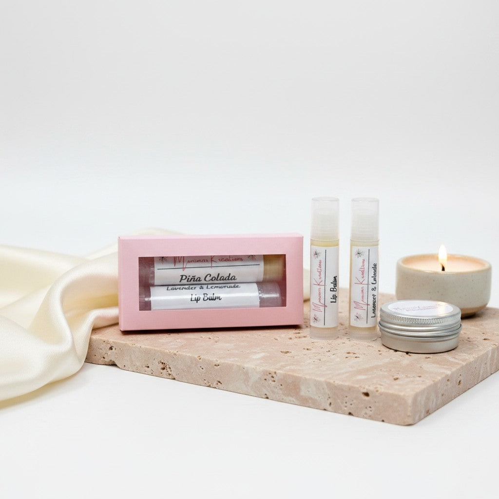 monimarkreations Perfect Lips Bundle featuring two lip balms: Piña Colada and Lavender & Lemonade, in a pink gift box.